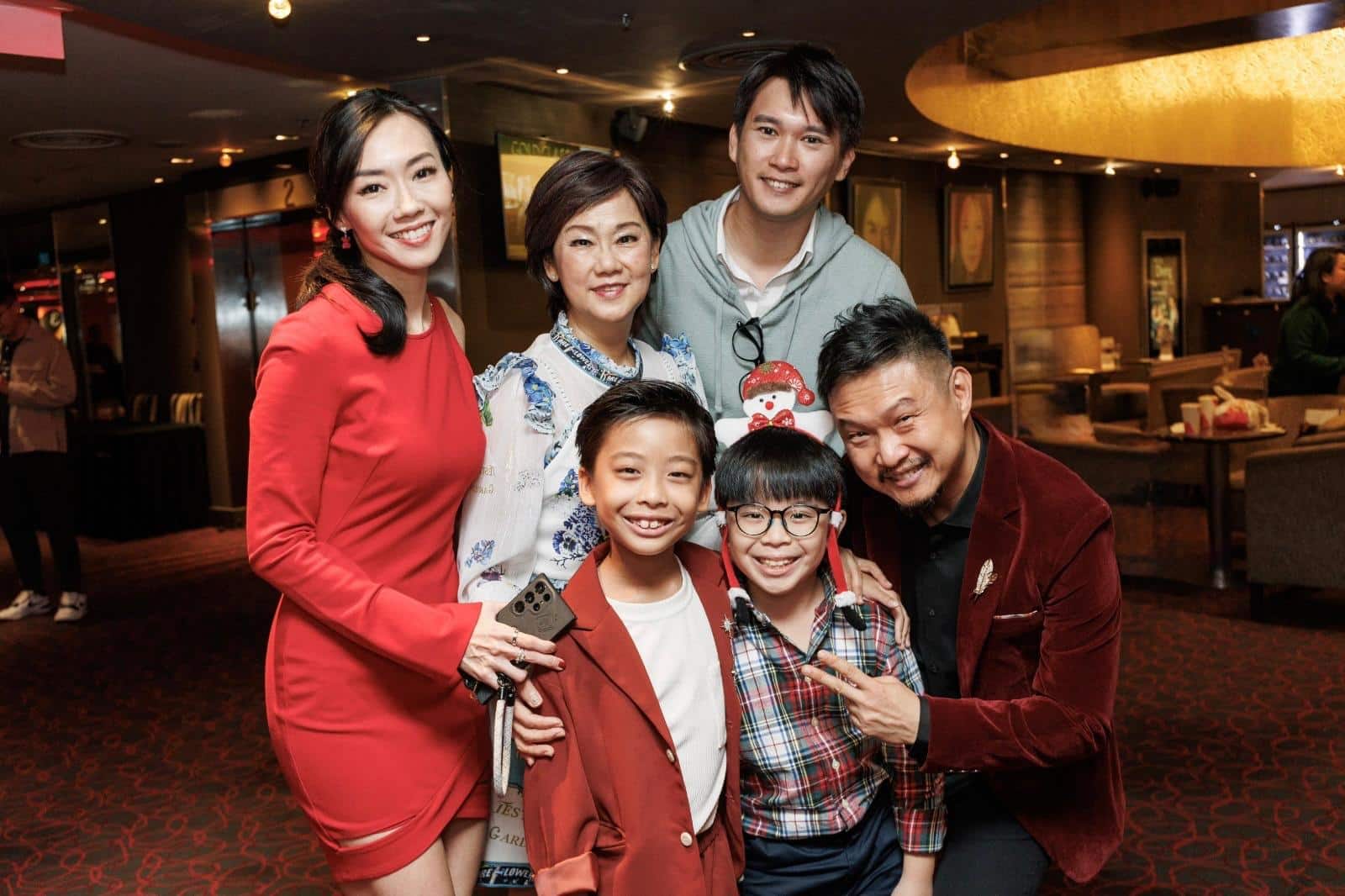 Hi Noel family at gala premiere with Eric Wong