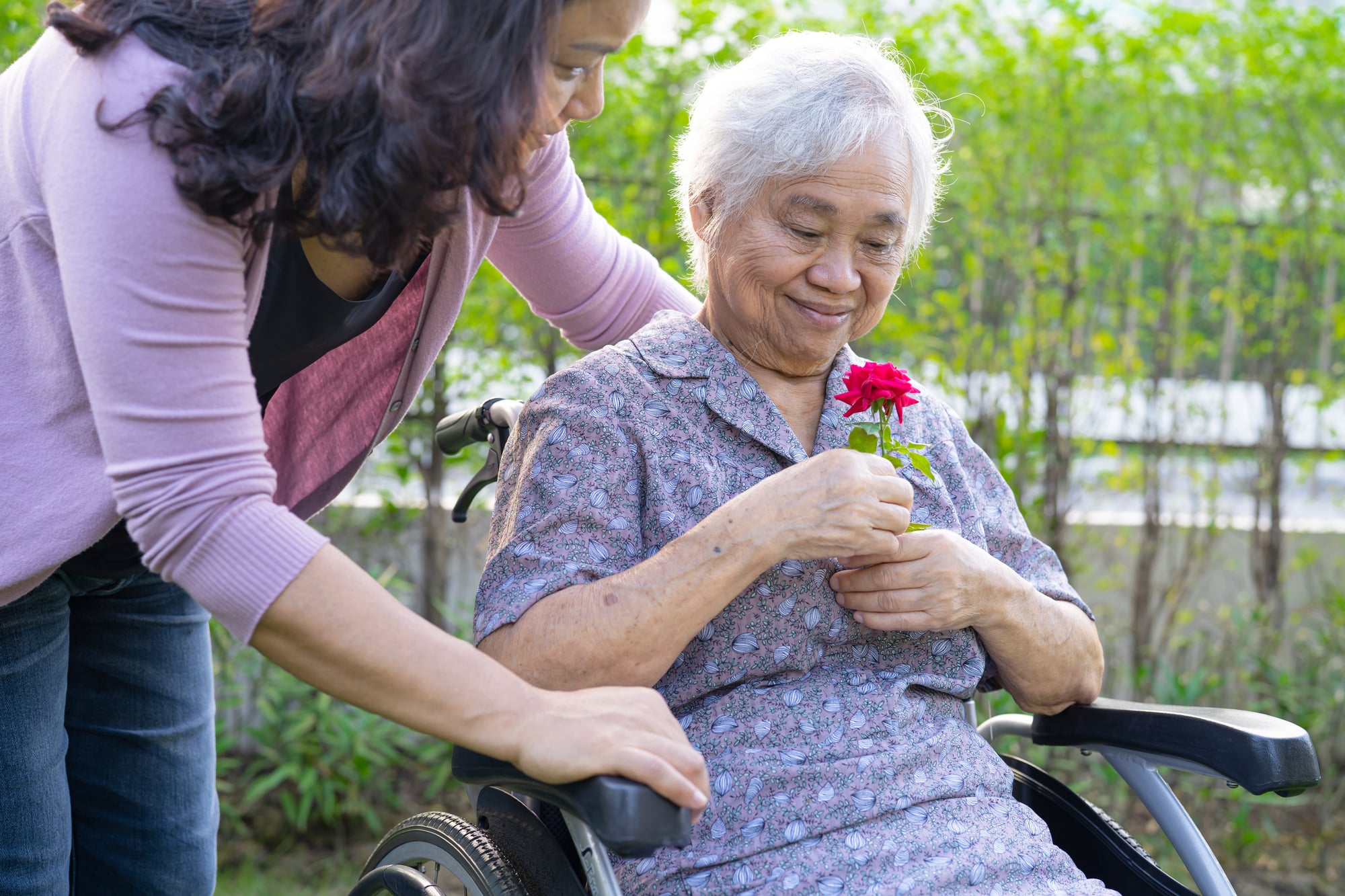 Caregiver daughter hug and help  Asian senior or elderly old lad